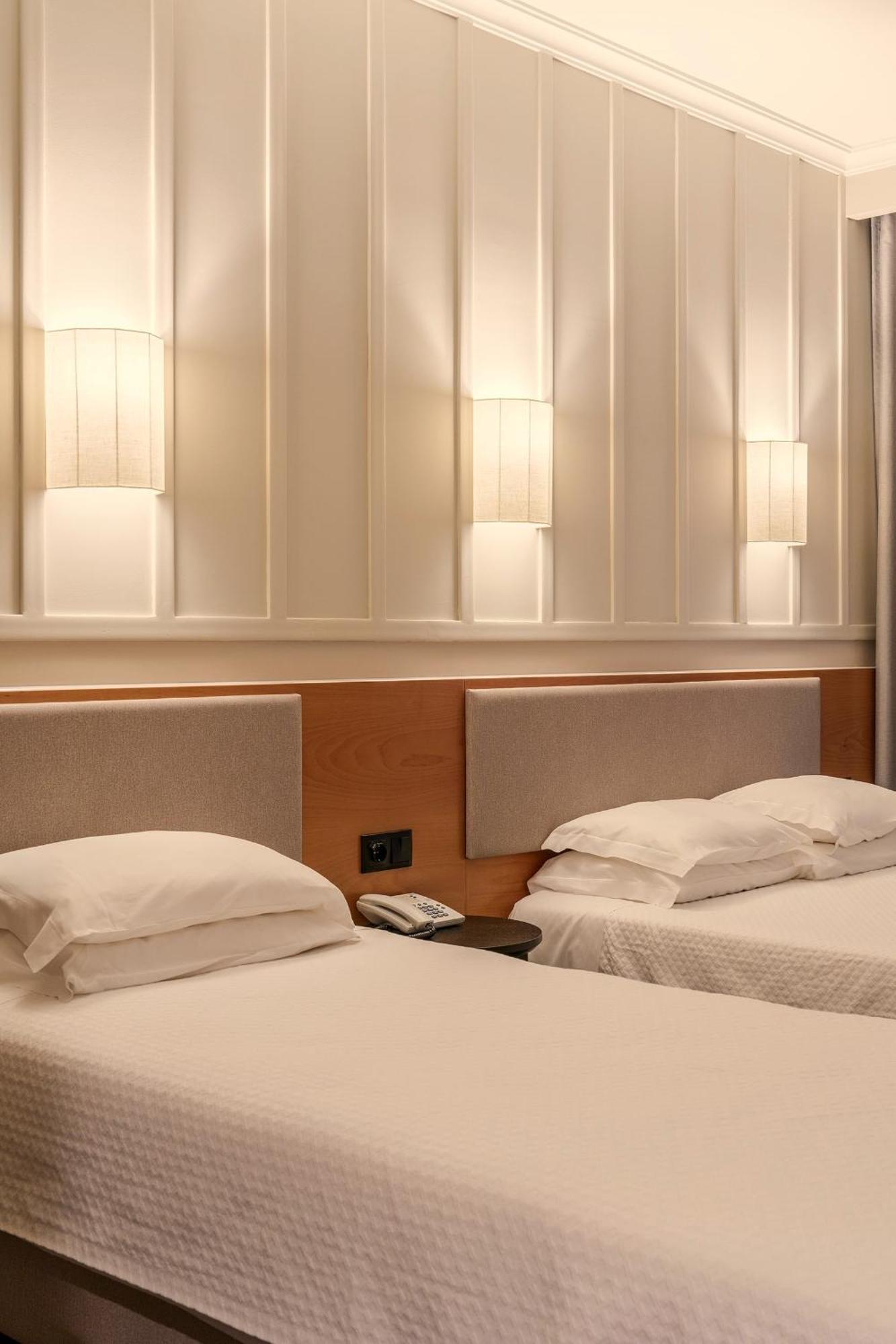 Quarto com Cama de Casal ou 2 de Solteiro e Cama Extra